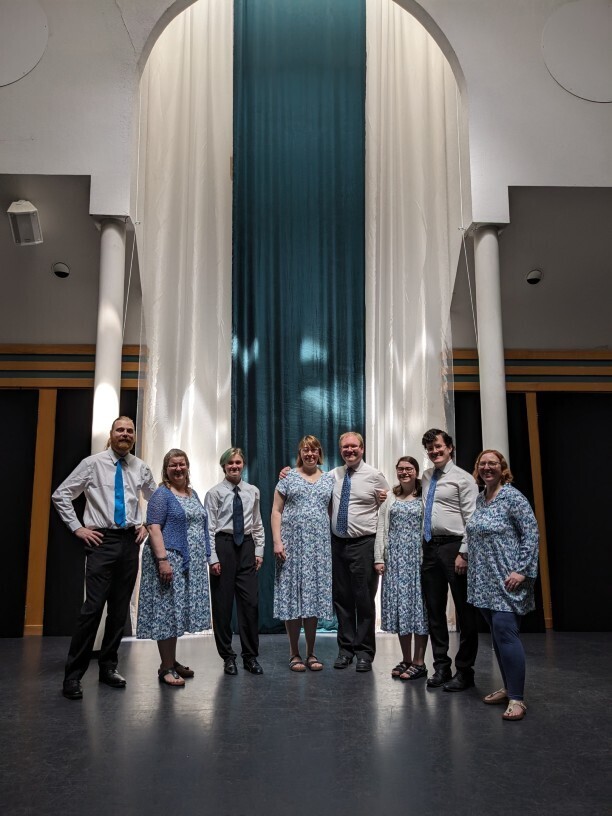 ReSound members Gathering in front of a pipe organ